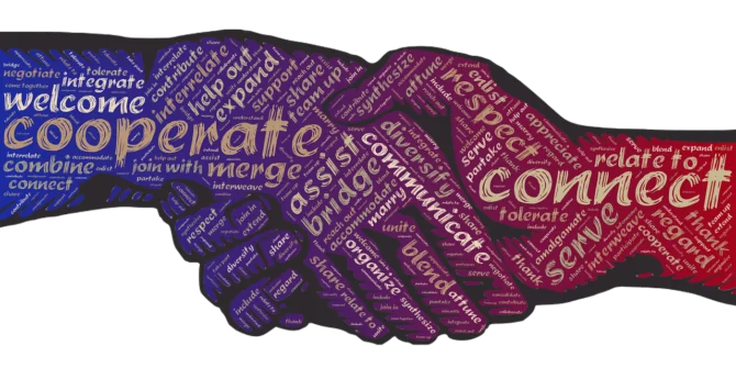 Collaborative word collage on a handshake.